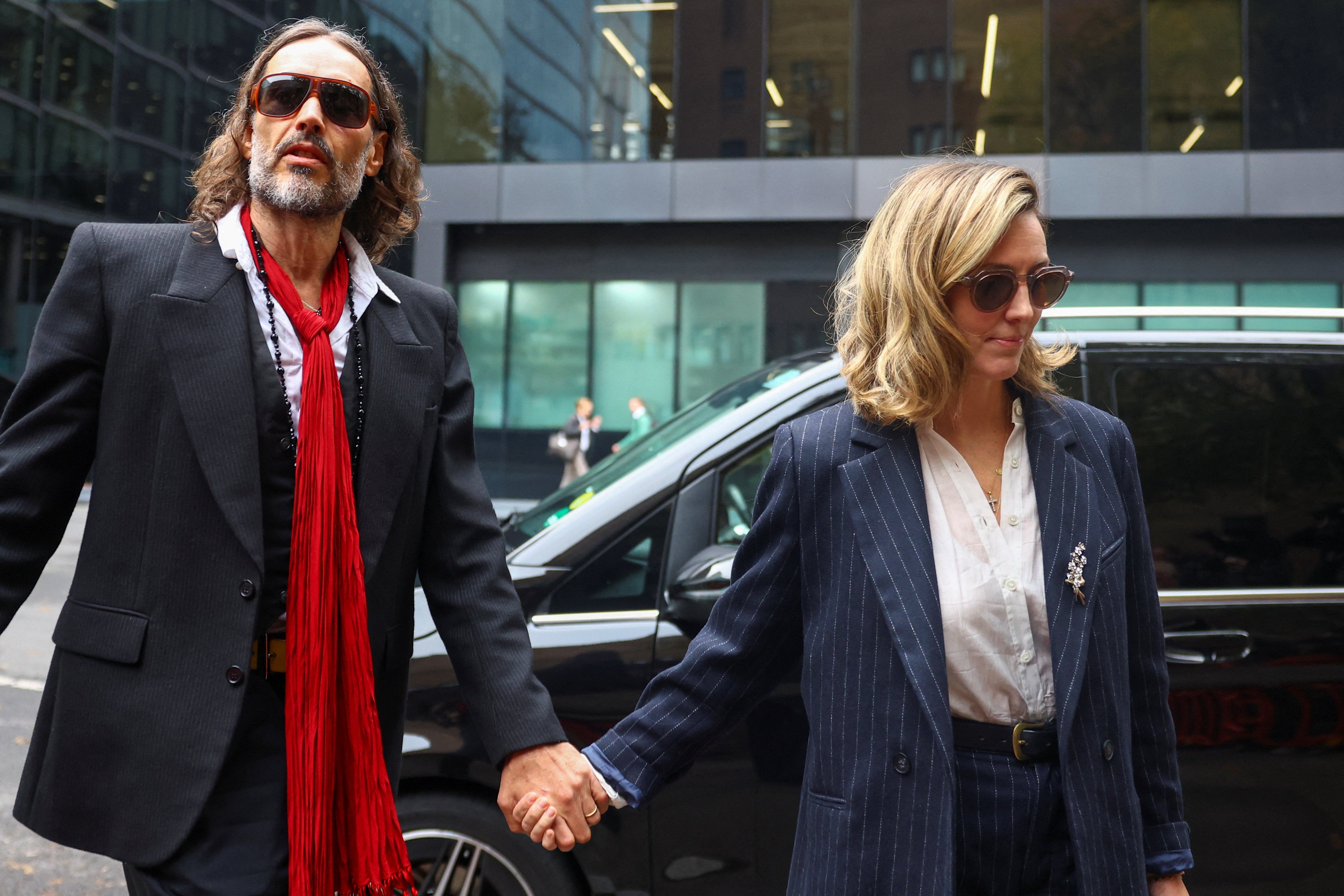 Russell Brand’s wife tells rape trial he is a 'kind' husband despite cheating while dating - The Independent