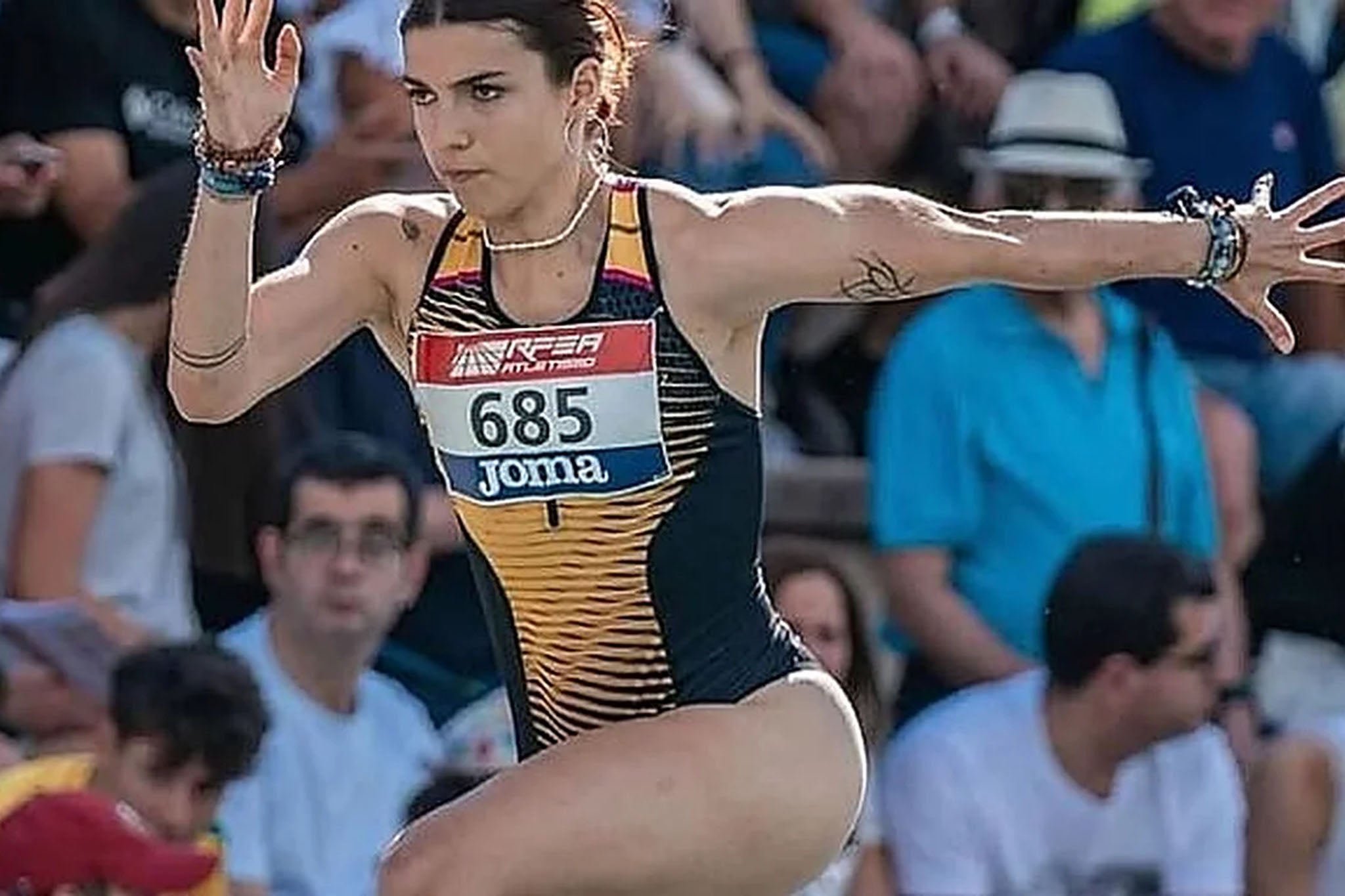 Gallego competed in the long jump for her country