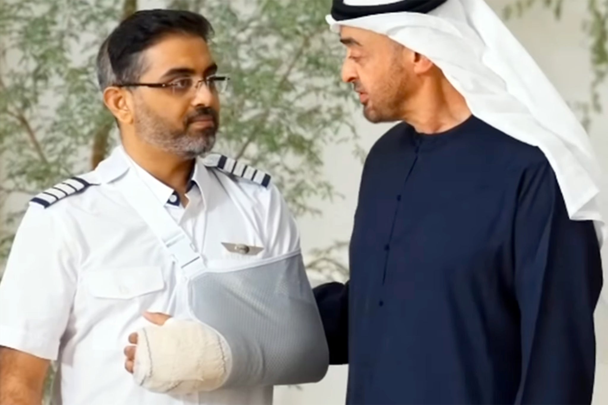 The Flydubai pilot (left) spoke with UAE president Sheikh Mohamed bin Zayed about his injuries