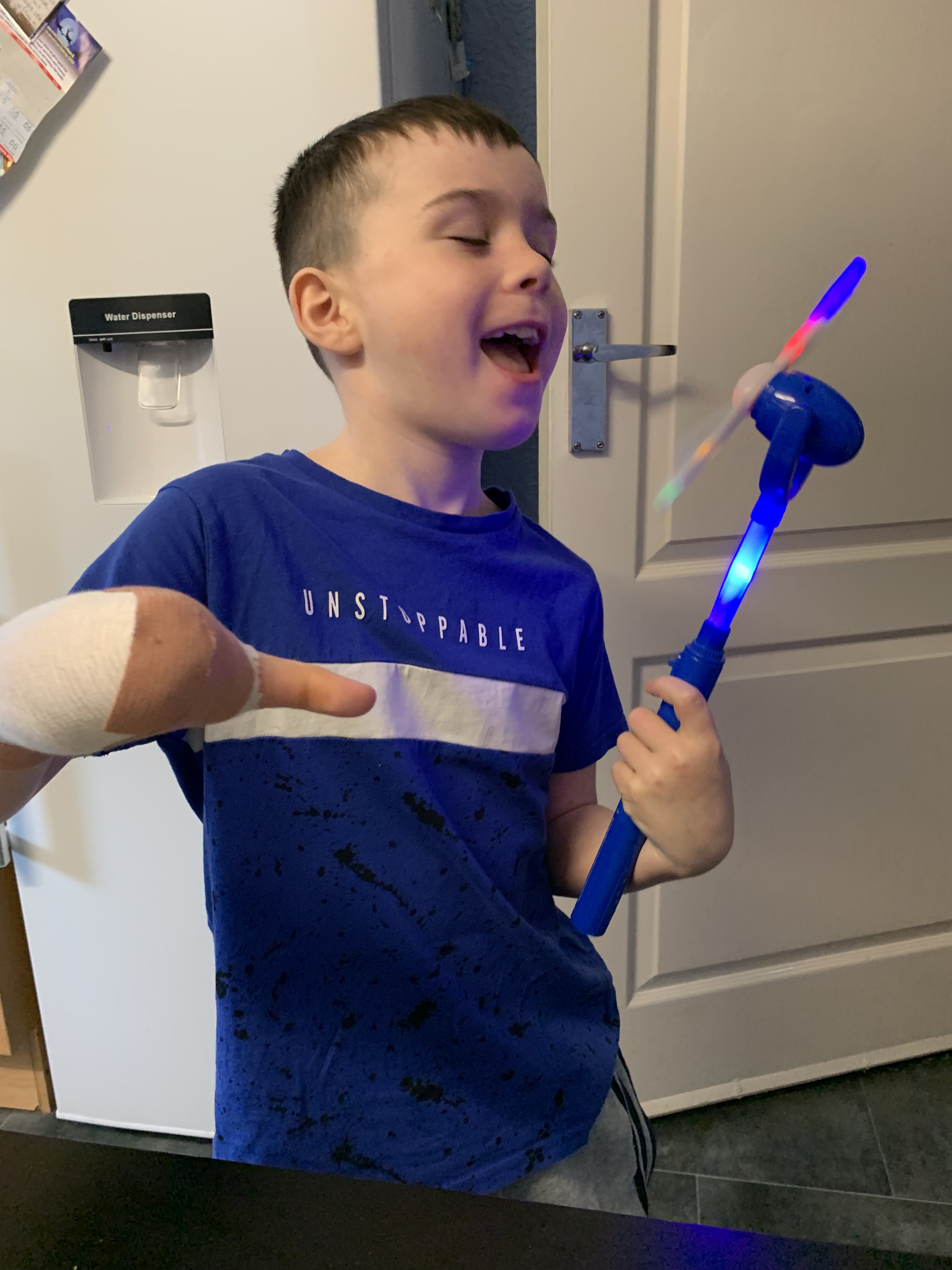 Riley had to learn to write with his left hand after being released from hospital (SFRS/PA)