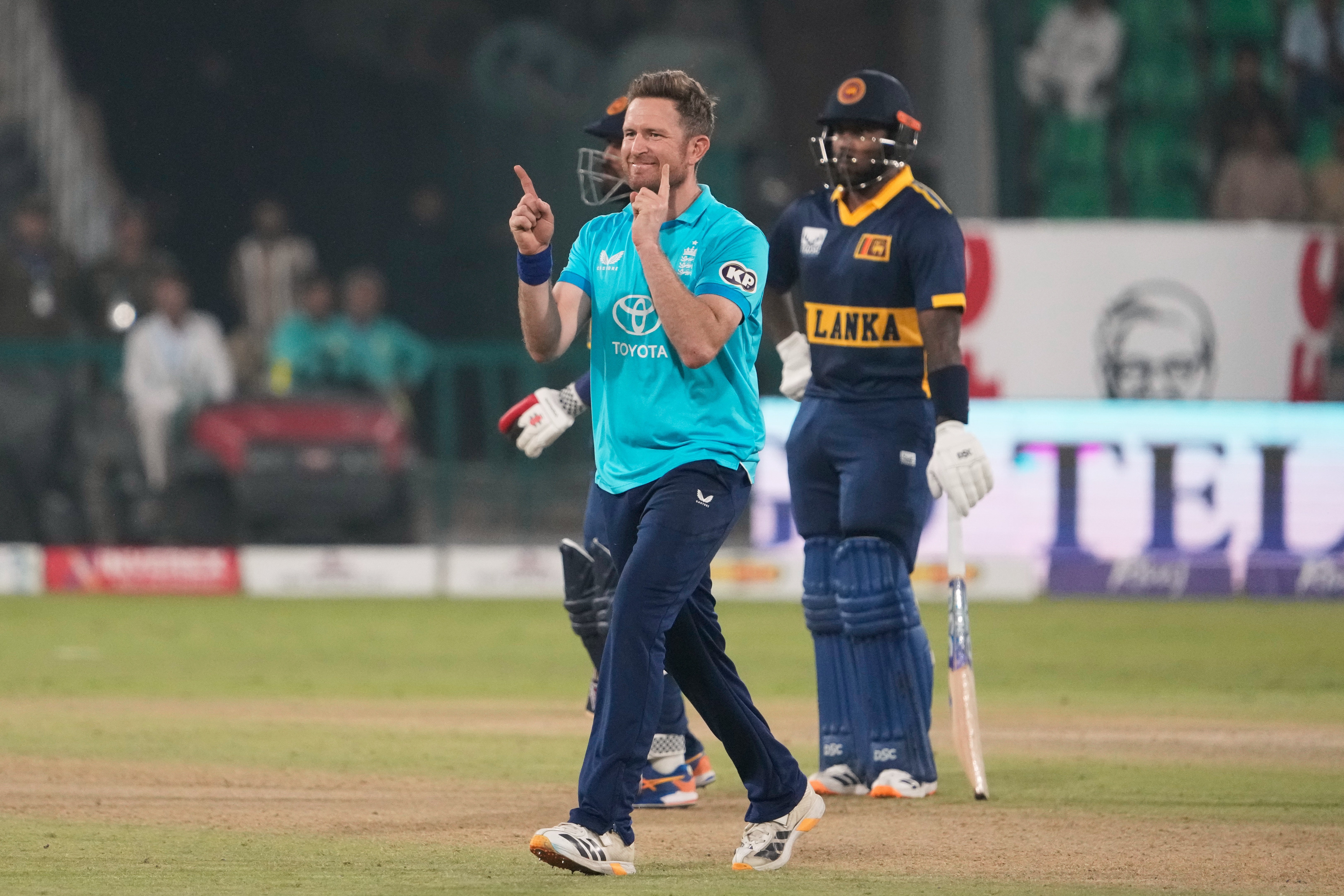 England’s Liam Dawson celebrates claiming the wicket of Sri Lanka’s Avishka Fernando (K.M. Chaudary/AP)