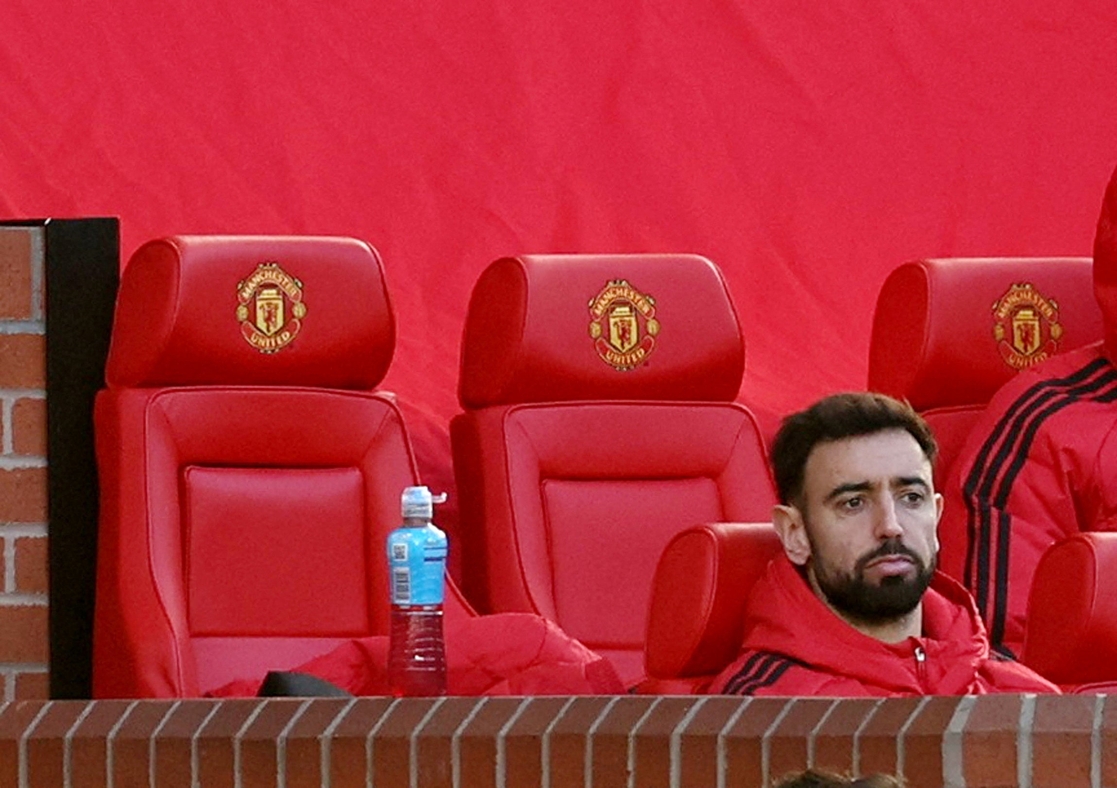 Manchester United captain Bruno Fernandes watches on