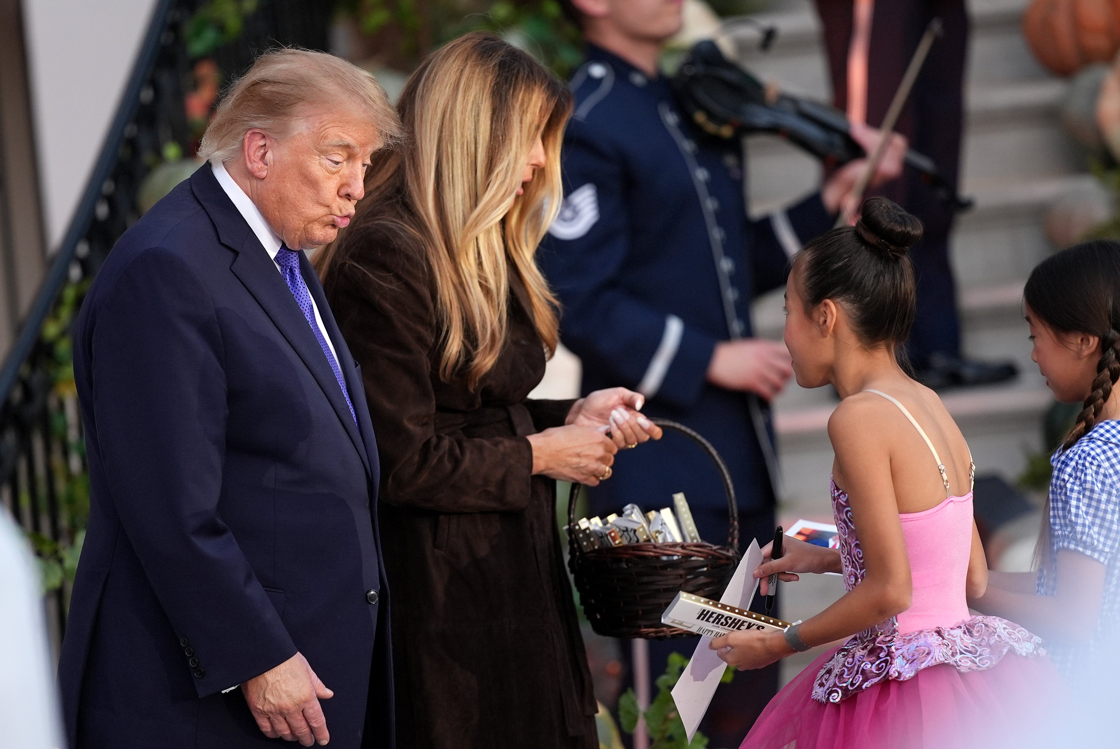 President Donald Trump has made it through another Halloween event at the White House — this time without going viral for putting candy on the head of a child dressed as a short yellow henchman from the Minions movie franchise