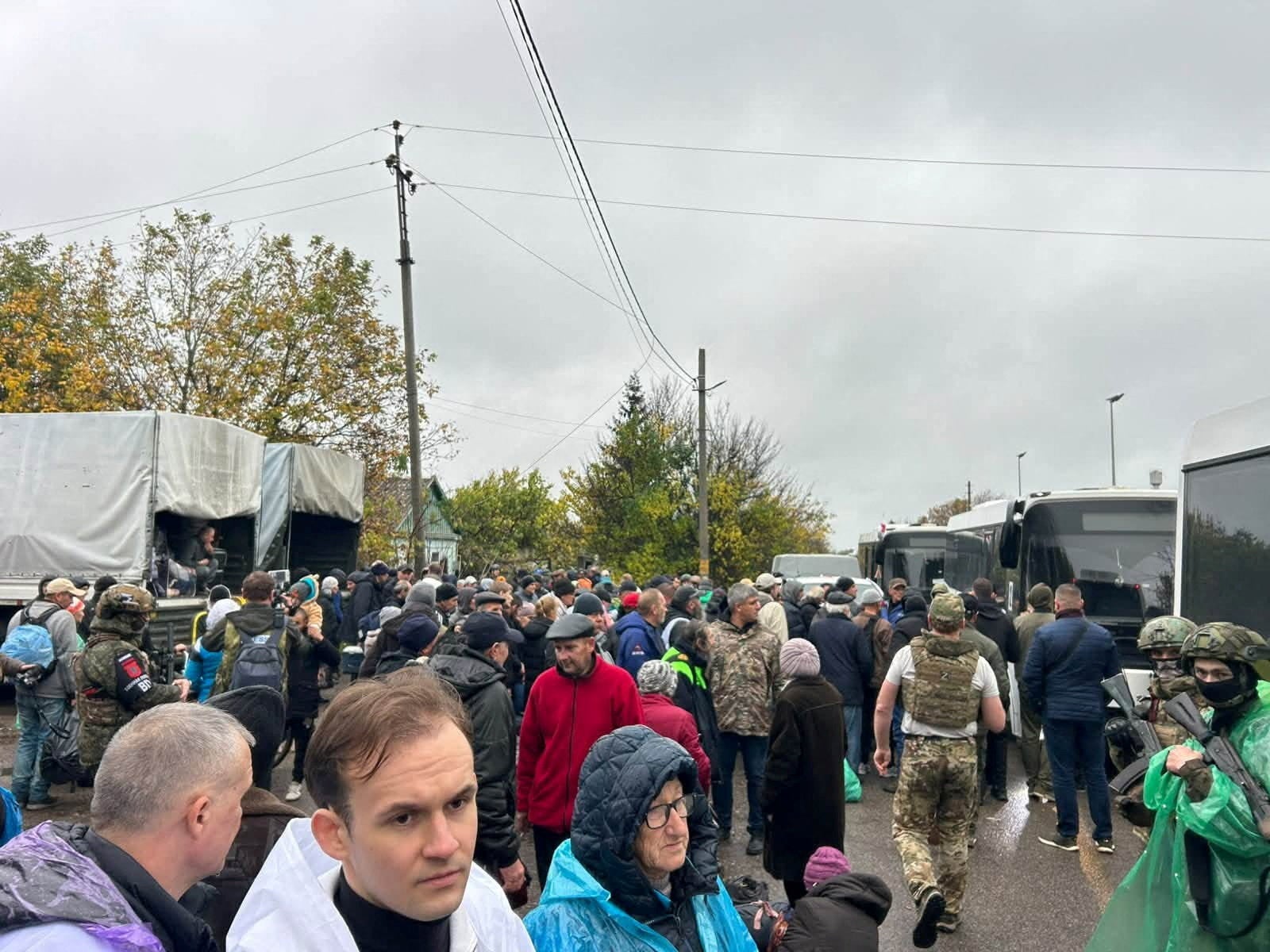 Residents during the evacuation of Oleshky on Friday