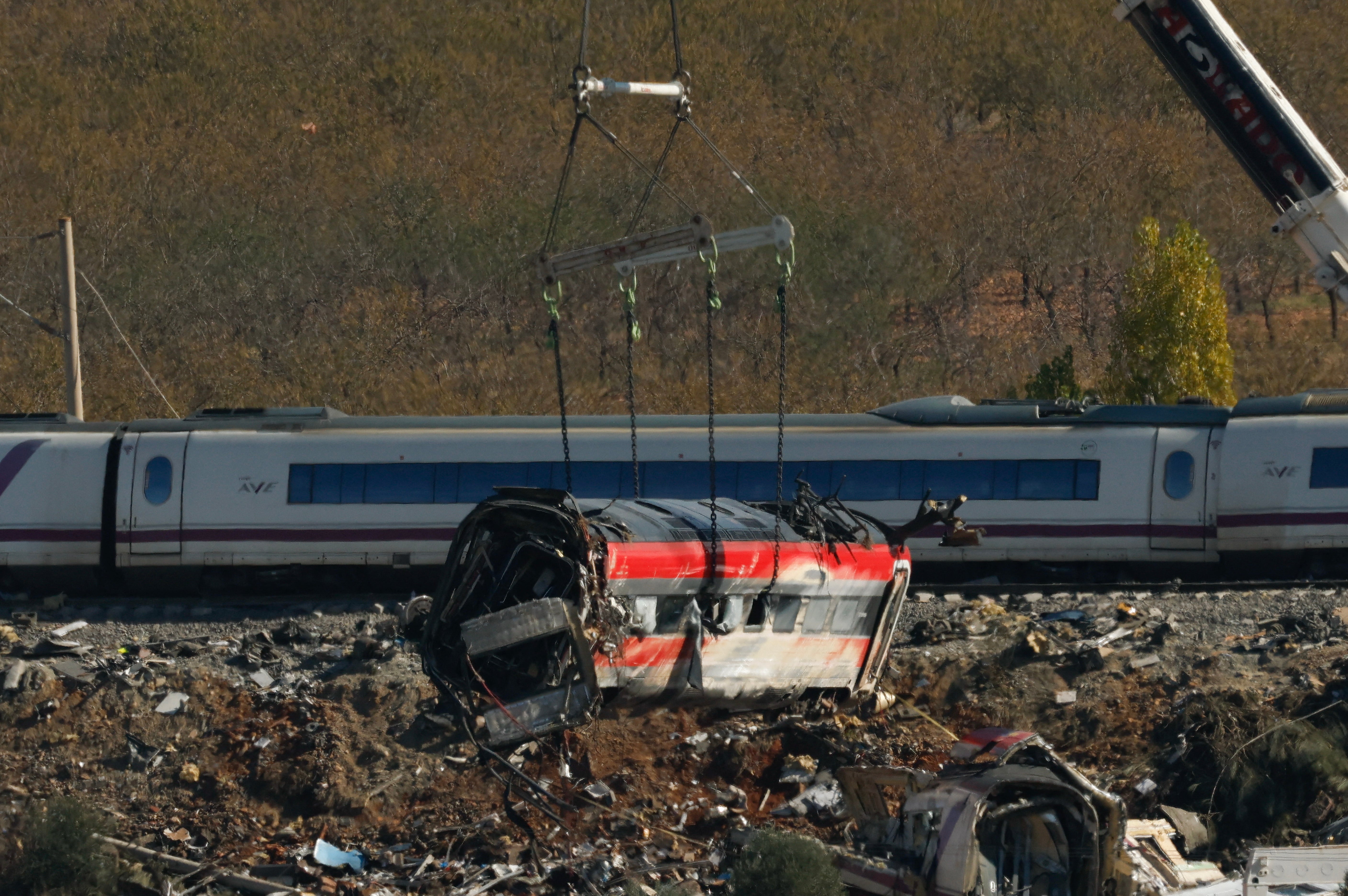 The high-speed collision has killed at least 69 people and injured scores more