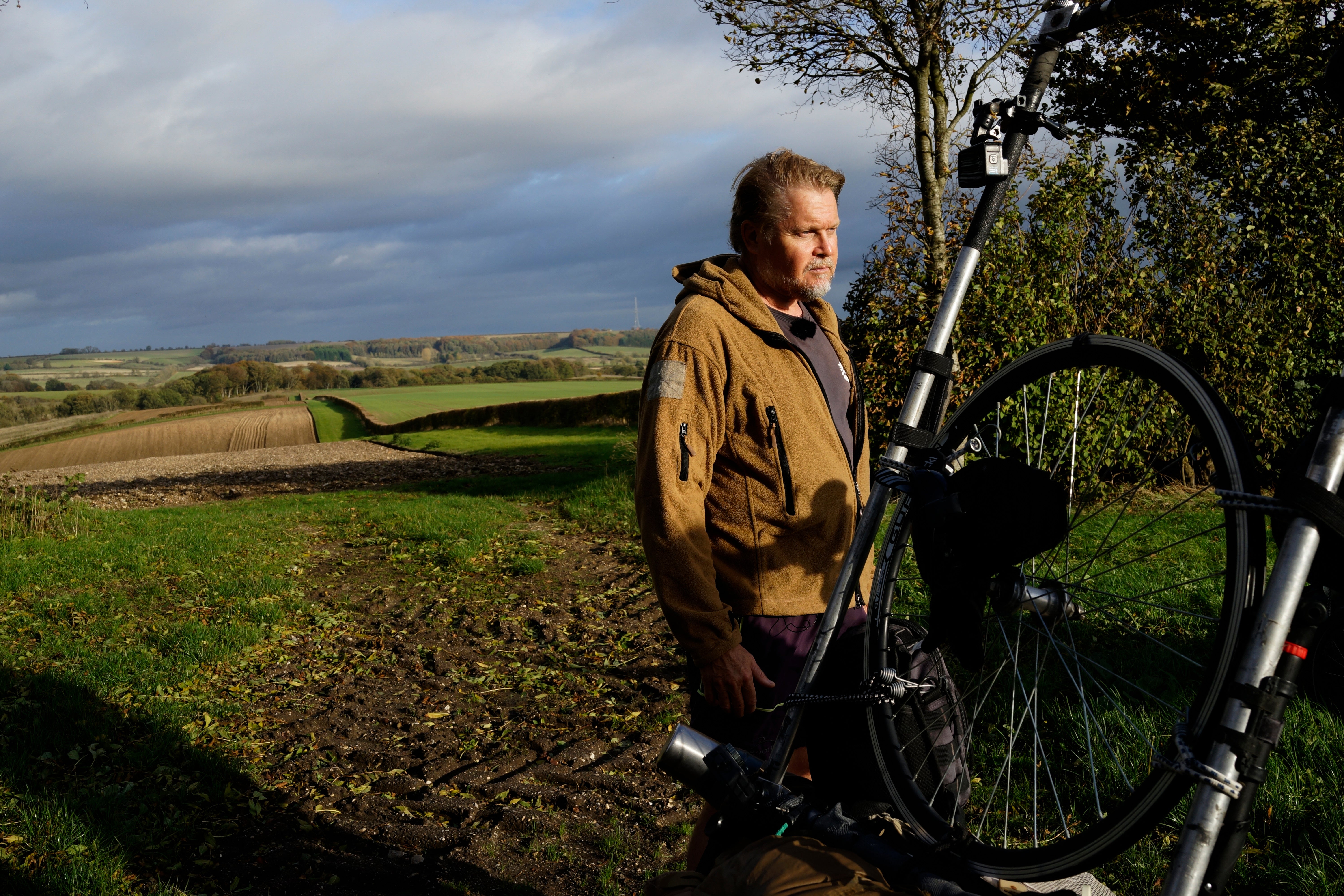 British adventurer Karl Bushby pauses near Market Rasen, Lincolnshire, England, Wednesday, Oct. 28, 2026, on the final stretch of his 28-year walk around the world to get back to his mother's home in Hull. (AP Photo/Brian Melley)