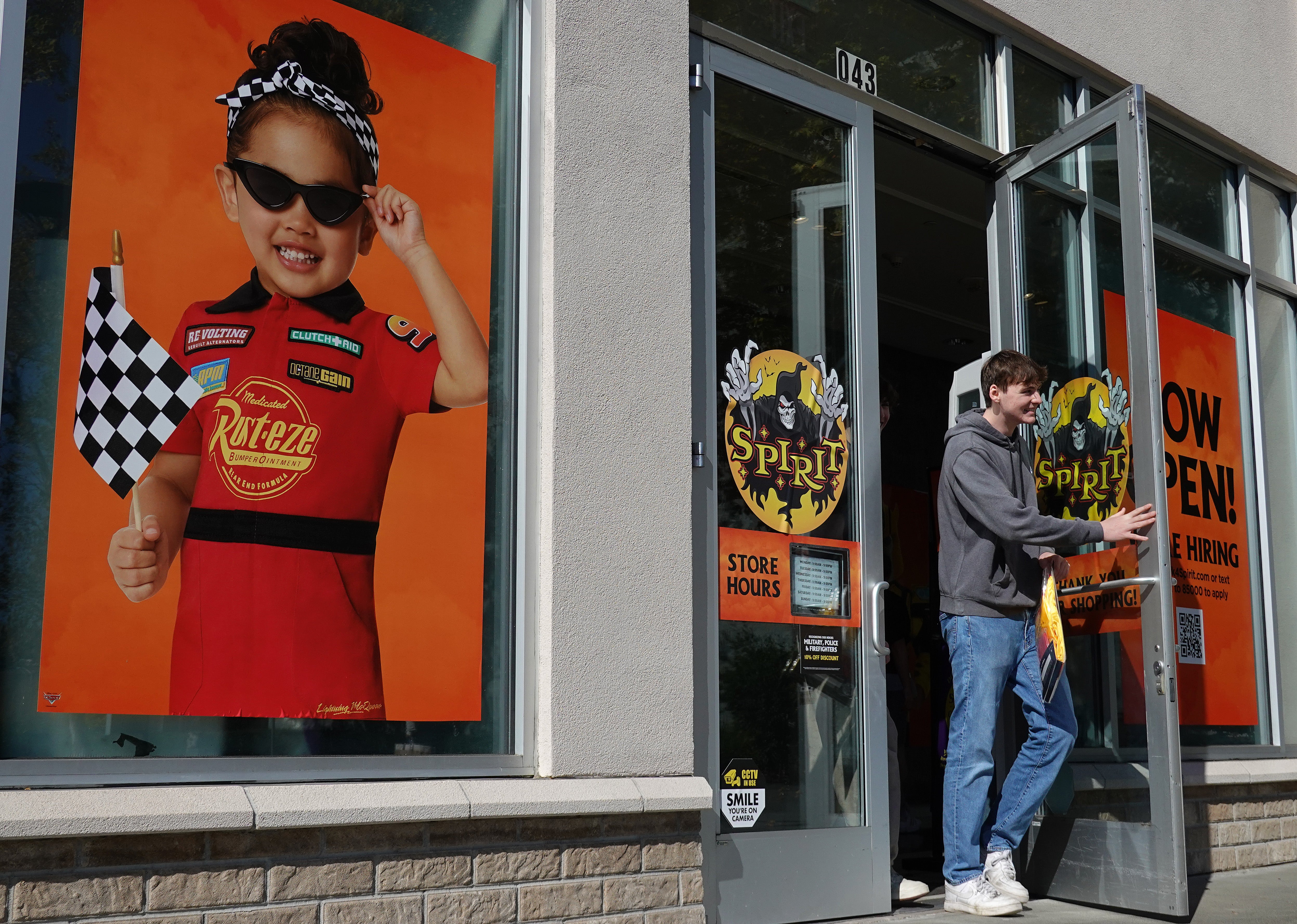 Suspect on the loose after 1 person dead and six injured at Spirit Halloween store shooting