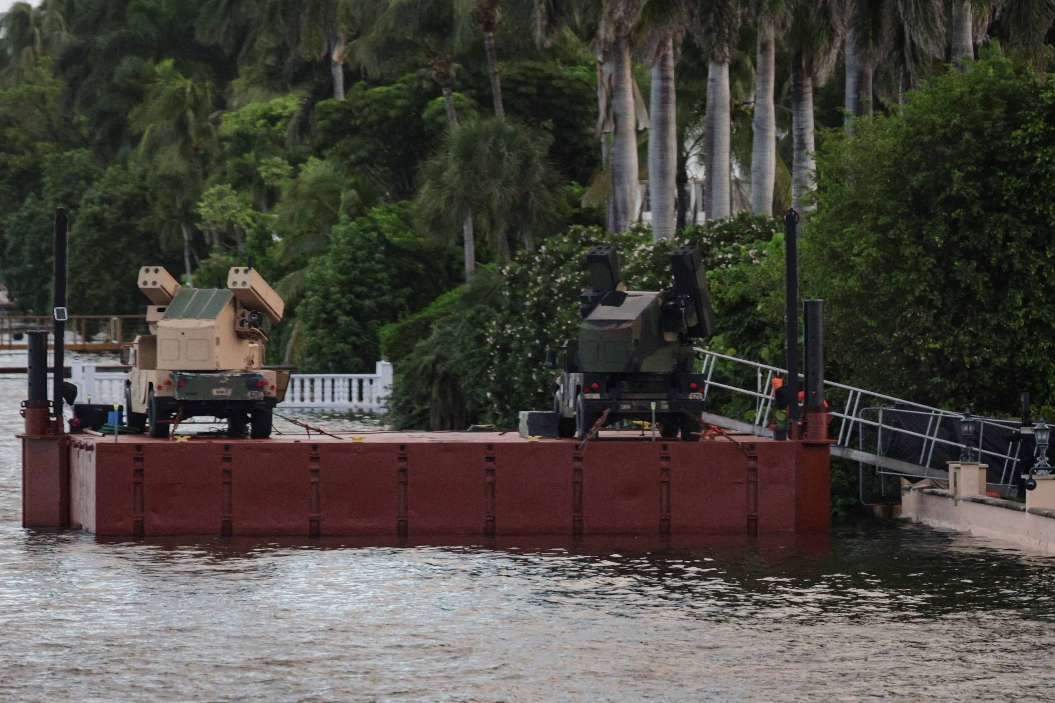Two AN/TWQ-1 Avenger Air Defense Systems were seen stationed on a floating platform in Lake Worth Lagoon on the shoreline of Mar-a-Lago on October 24