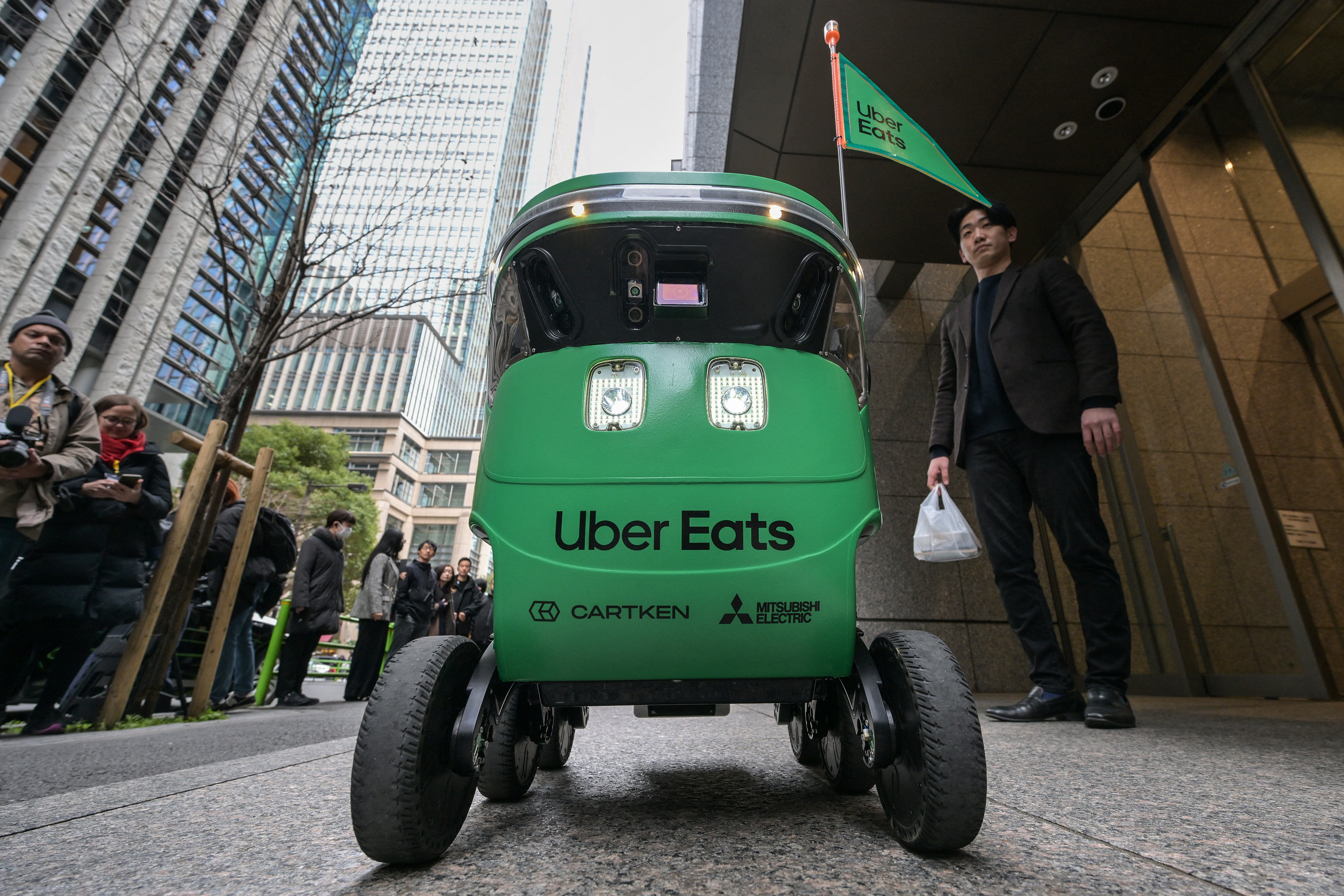 78-year-old former college professor arrested for blocking delivery robot in protest