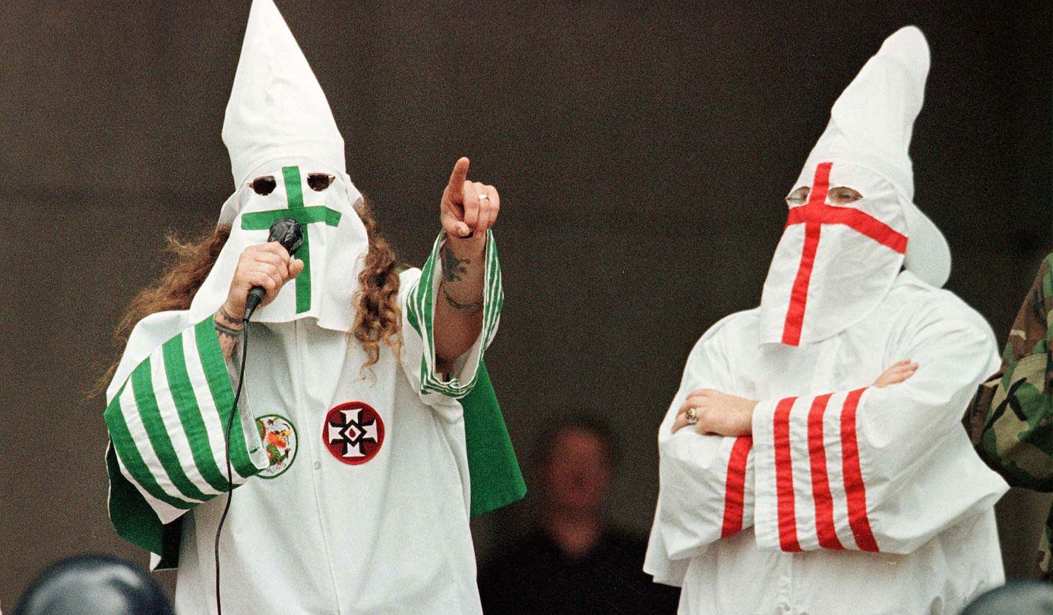 File photo: A KKK rally on 21 August 1999 in Cleveland, Ohio. A middle school teacher in Pulaski County, Kentucky, was suspended after she allowed a student to dress up as a KKK grand wizard as part of a history project