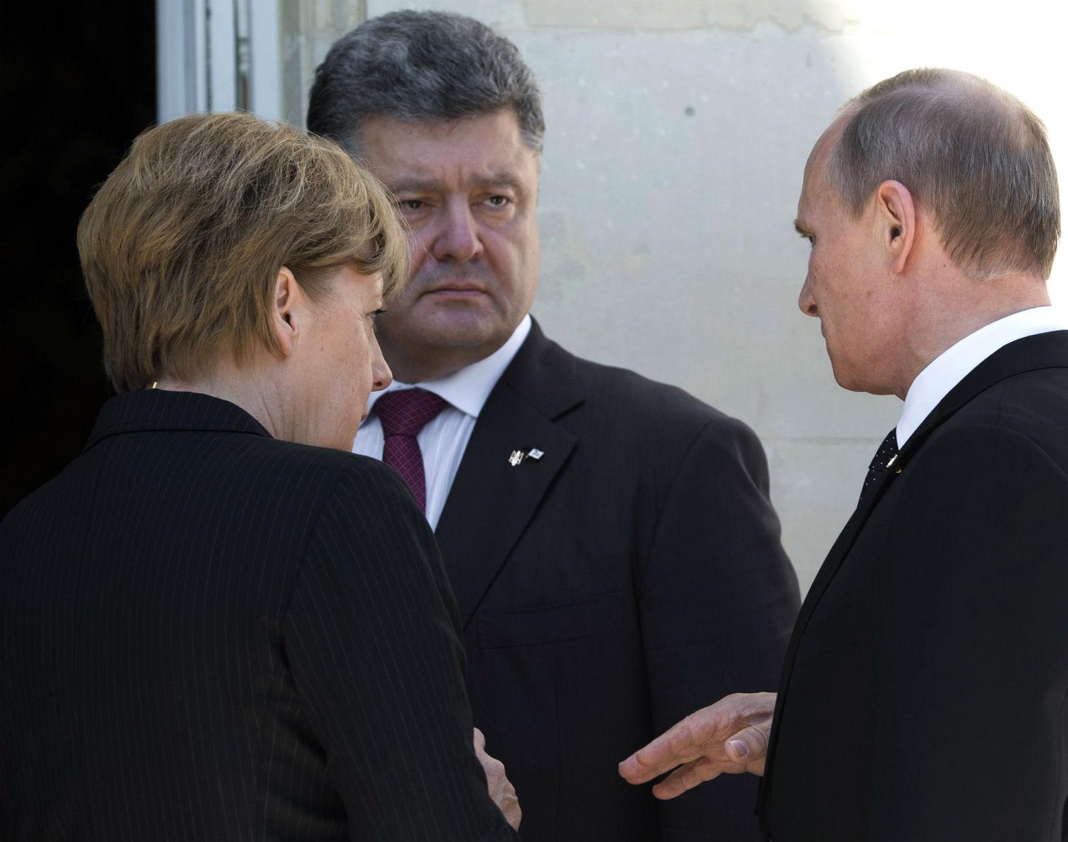 Former German chancellor Angela Merkel mediates a tense meeting between then-Ukrainian president Petro Poroshenko and Vladimir Putin at a D-Day commemoration in 2014