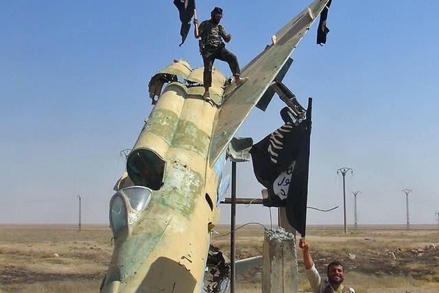 Isis troops near Raqqa, Syria