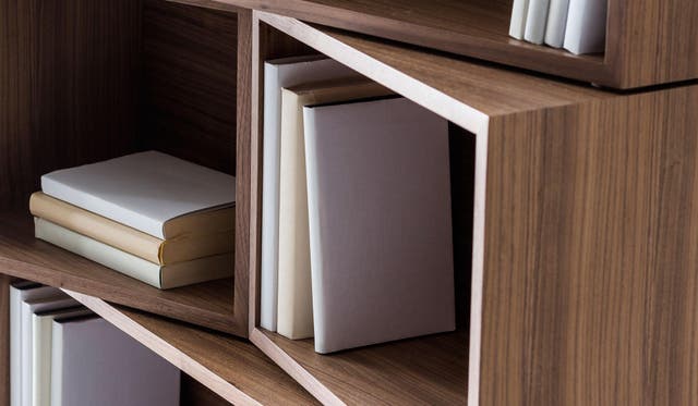 Stack the units in this bookshelf the conventional way, or put them on a slant 