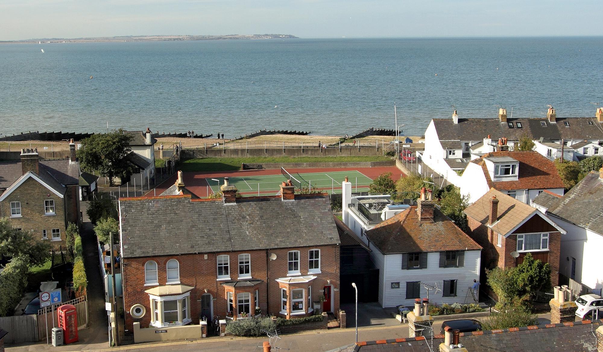 A Victorian end of terrace three-bedroom house with magnificent sea views and a wealth of period features throughout.