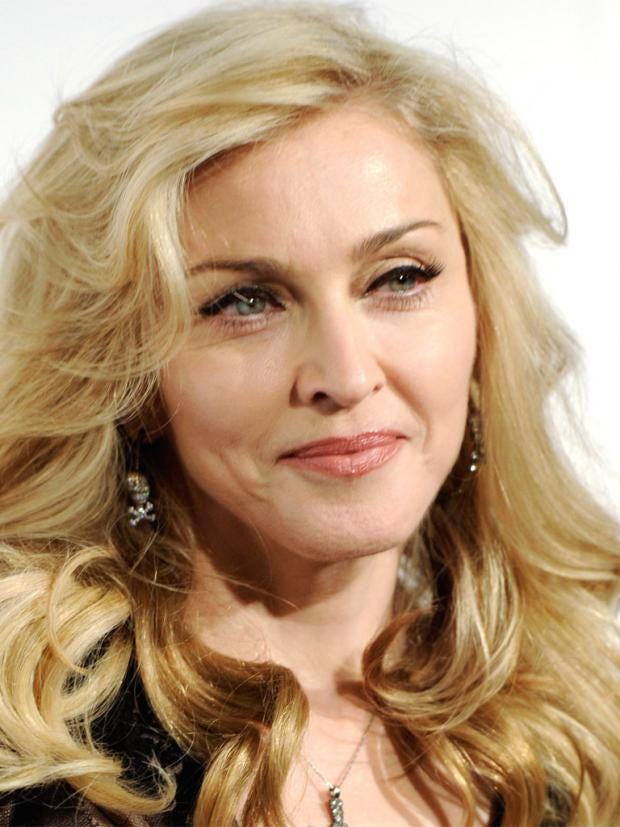 Madonna: I was held at knifepoint and raped | The Independent