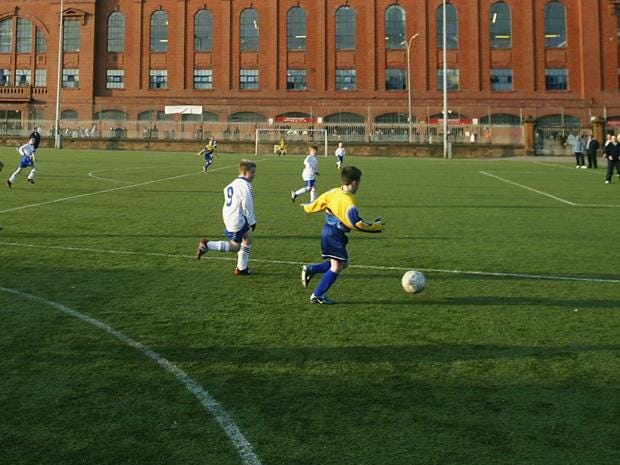 children-playing-football.jpg