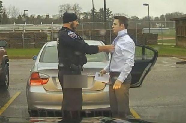 Cop does speeding college student a favor by tying necktie
