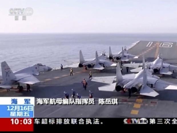 China Warship Carries Out Fighter Drills Over Open Seas The Independent 