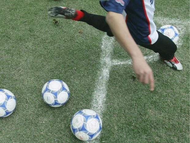 Man arrested in United Kingdom over alleged football abuse