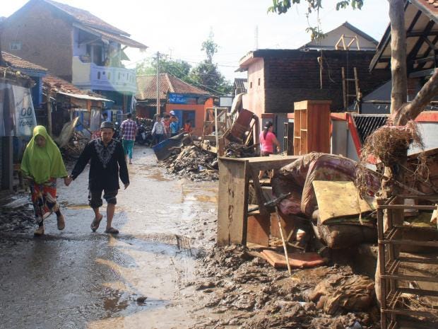 Image result for Deadly landslide, flooding in Java after days of rain