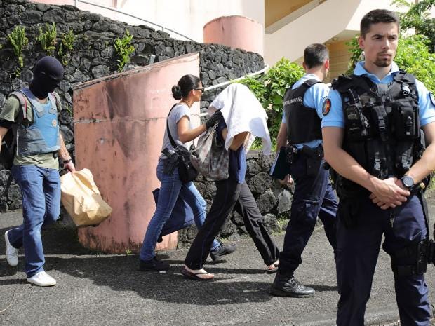 2 police officers wounded in shooting on French island of Reunion