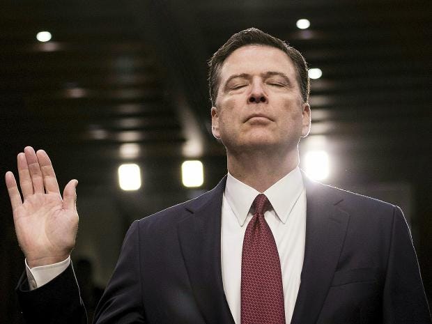comey-prays.jpg