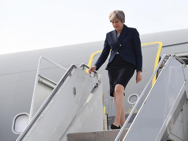 Theresa May arrives in Ottawa, Canada