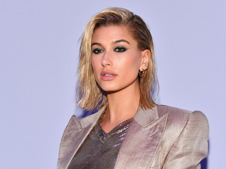 Hailey Bieber wears custom Vera Wang dress and trainers to wedding party - e-nigeria!