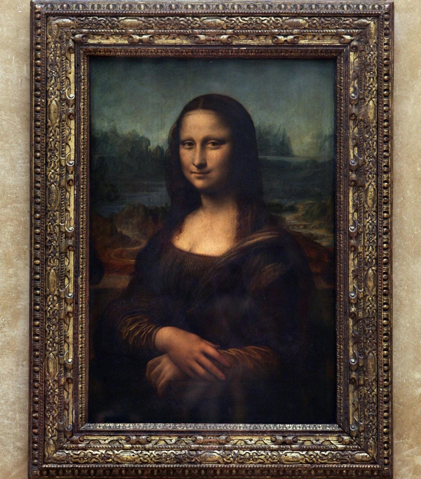 Mystery of Mona Lisa's smile 'solved' as experts say Da Vinci used the ...