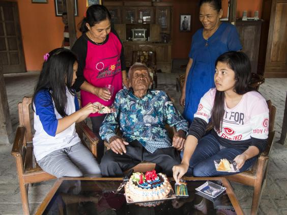 Attending his party were his grandson, Mr. Suryanto and wife Mr. Suwarni with their children Erika Kurniawati and Anisa Kurniawati. Image: Donal Husni/ZUMA Wire/REX/Shutterstock