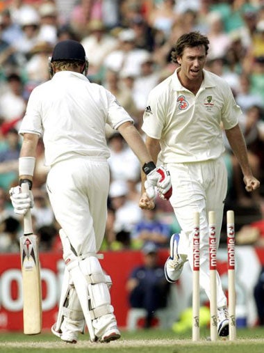 McGrath (right) sends Ian Bell back to the pavilion during the first day of the fifth Ashes Test