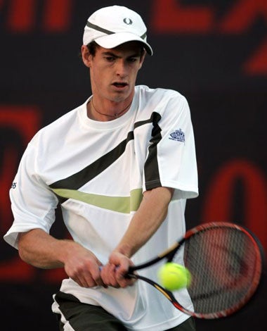 Murray on his way to a 6-1, 6-3 victory against Christophe Rochus at the Qatar Open