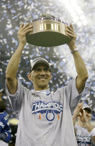 Colts coach, Dungy, celebrates winning the AFC Championship