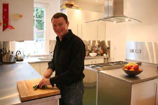Theo Randall at home in his kitchen