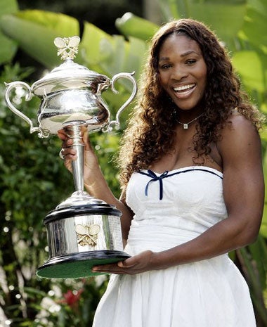 Williams with the women's singles trophy after her stunning victory at the Australian Open