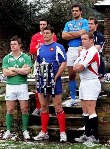 Ireland's Brian O'Driscoll (left) joins the other national captains with the Six Nations trophy