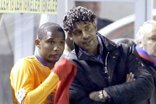 Eto'o and manager Frank Rijkaard before their falling out