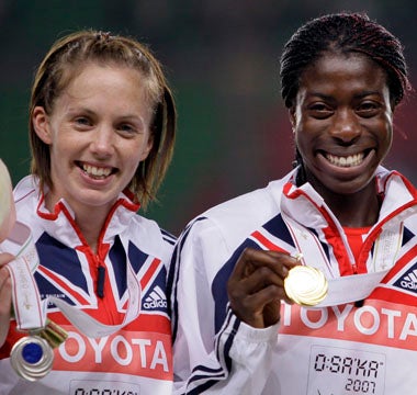 Nicola Saunders (left) and Christine Ohuruogu show off their 400 metres medals