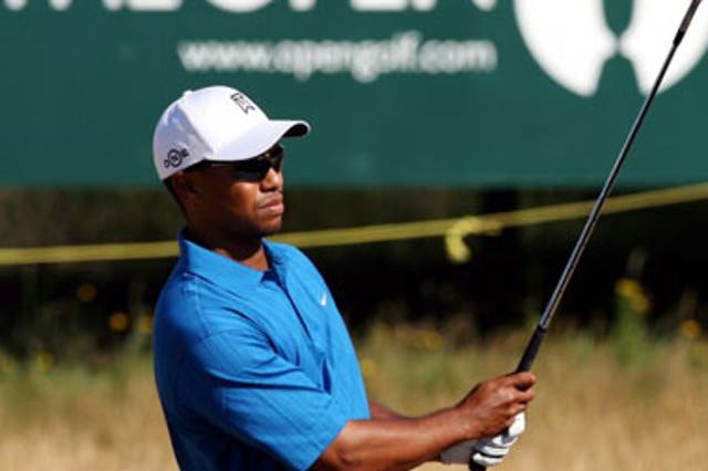 Woods prepares for The Open