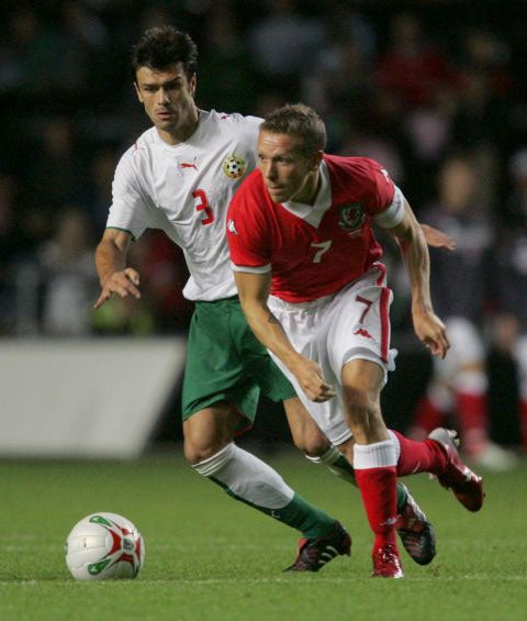 Liverpool striker Craig Bellamy struggles to find a way past the Bulgarian defence