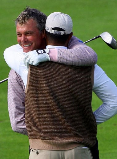 Woods and Clarke embrace ahead of the Ryder Cup