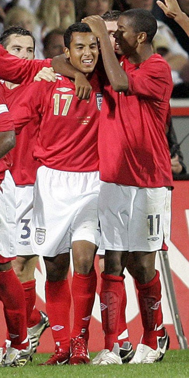 Walcott (17) celebrates his first goal in Germany