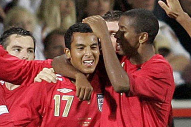 Walcott (17) celebrates his first goal in Germany