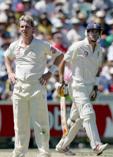 Australian bowler Brett Lee (left) stands in awe of the catch that dismissed Kevin Pietersen (right)