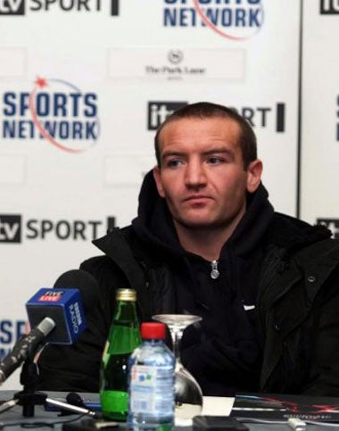 Britain's featherweight world champion faces the media