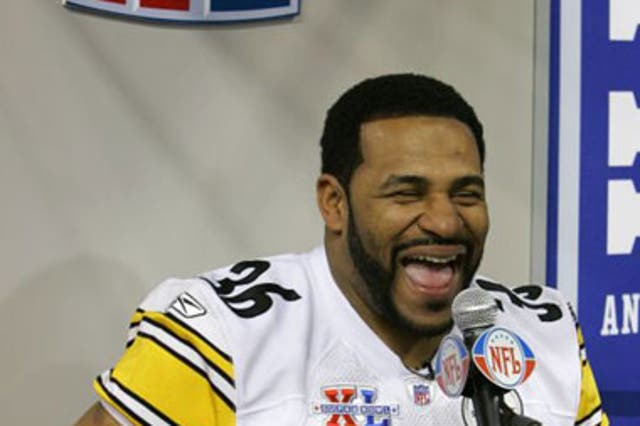 Steelers running back Jerome Bettis shares a joke with the media ahead of Super Bowl XL