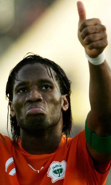 Drogba celebrates leading his country to the Nations' Cup final