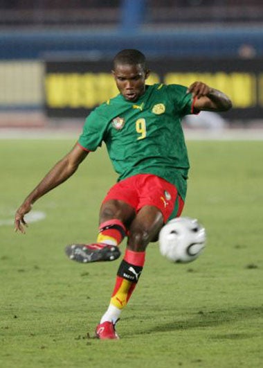 Eto'o curls in his and Cameroon's first goal against Angola