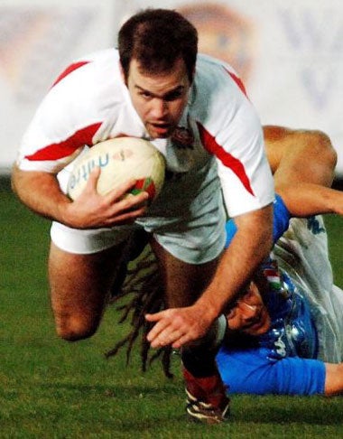 Fly-half Charlie Hodgson scores one of England's four tries