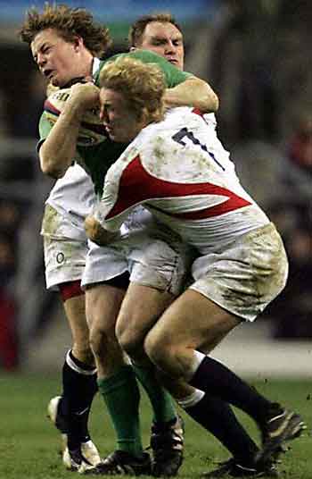 England's Andy Goode, reas and Lewis Moody, front tackle Ireland's Brian O'Driscoll